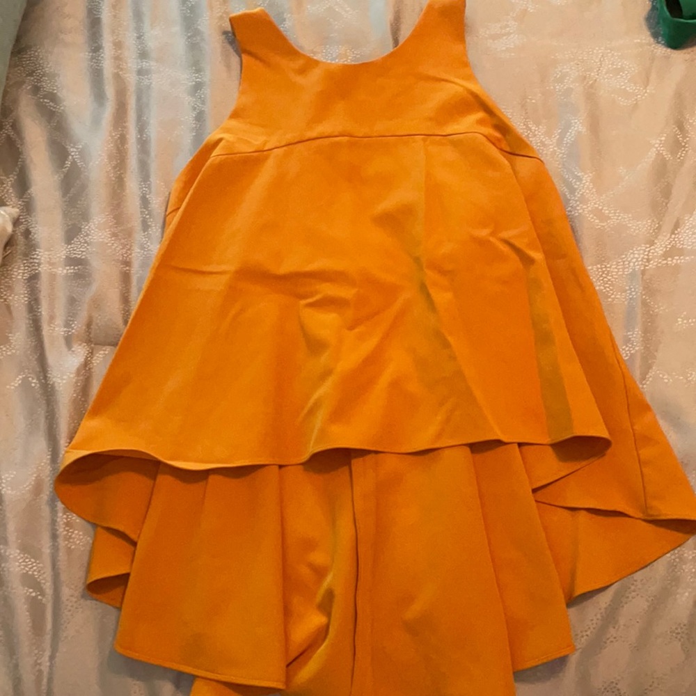 Milly mustard sleeveless high-low top; size large